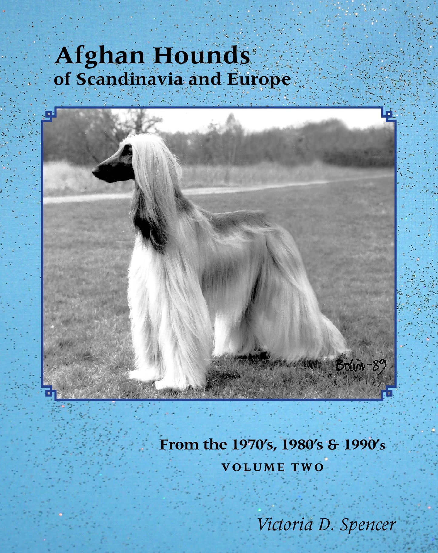 The cover page of Afghan Hounds of Scandinavia and Europe from the 1970's, 80's and 90's (Vol. 2) by Victoria D. Spencer, featuring a black and white photos of an Afghan Hound on a textured blue background